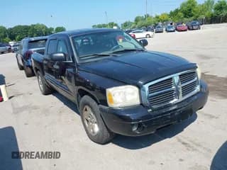 ✅ 2005 Dodge Dakota SLT • VIN: 1D7HW48N05S119919 • Lot: 42605894. Listed on IAAI with 181,701 mi. Free auction sales archive from the USA and detailed vehicle history report at DreamBid. Image 1.