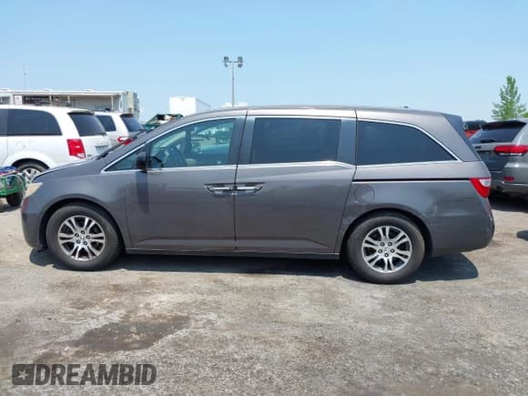 ✅ 2012 Honda Odyssey EX-L • VIN: 5FNRL5H68CB052440 • Лот: 42416126. Опубликован ранее на IAAI с пробегом 128 397 миль. Бесплатный доступ к архиву аукционных продаж из США и подробный отчёт об истории автомобиля на DreamBid. Изображение 14.