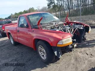 2002 Dodge Dakota z VIN 1B7FL36N02S506313, wystawiony jako IAAI lot #41587367 z przebiegiem 65 304 mil mil oraz . Historia ofert i sprzedaży dostępna na DreamBid. Obrazek 1.