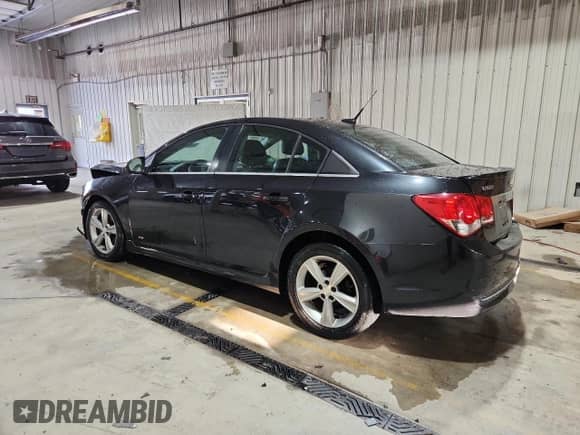2014 Chevrolet Cruze 2LT с VIN 1G1PE5SB7E7429252, выставлен на аукционе Copart как лот 89543125 с пробегом 195 739 миль миль и Списание • Salvage title. История ставок и продаж доступна на DreamBid. Изображение 2.