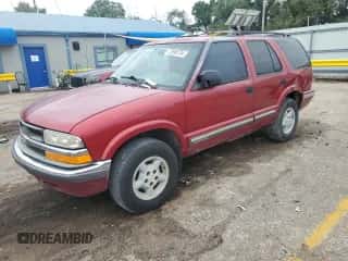 2000 Chevrolet Blazer LS with VIN 1GNDT13W3Y2133969, listed as a Copart auction lot 72696734 with 223,251 mi miles and Salvage title. Bid and sale history available at DreamBid. Image 1.