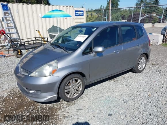 ✅ 2007 Honda Fit Sport • VIN: JHMGD38677S003326 • Lot: 43063227. Listed on IAAI with Not provided. Free auction sales archive from the USA and detailed vehicle history report at DreamBid. Image 17.