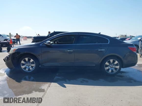 ✅ 2013 Buick LaCrosse Premium 2 • VIN: 1G4GH5E3XDF137436 • Lot: 41988900. Wystawiony na IAAI z przebiegiem 338 221 mil. Bezpłatny archiwum sprzedaży aukcyjnych z USA i szczegółowy raport historii pojazdu na DreamBid. Zdjęcie 15.