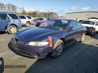 ✅ 2001 Pontiac Grand Prix GT • VIN: 1G2WP12K01F256118 • Lot: 79707064. Listed on Copart with 906,396 mi. Free auction sales archive from the USA and detailed vehicle history report at DreamBid. Image 1.