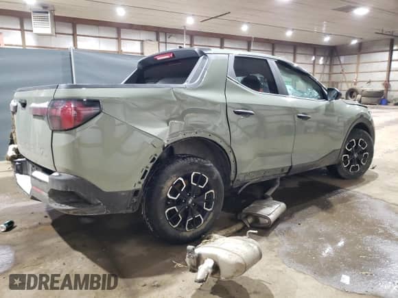 2023 Hyundai Santa Cruz SE z VIN 5NTJA4AE9PH049103, wystawiony jako Copart lot #42379435 z przebiegiem 27 793 mil mil oraz Szkoda całkowita • Salvage title. Historia ofert i sprzedaży dostępna na DreamBid. Obrazek 3.