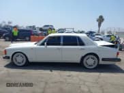 ✅ 1990 Bentley Turbo R • VIN: SCBZR03DXLCX32699 • Lot: 42960582. Wystawiony na IAAI z przebiegiem 38 147 mil. Bezpłatny archiwum sprzedaży aukcyjnych z USA i szczegółowy raport historii pojazdu na DreamBid. Zdjęcie 14.