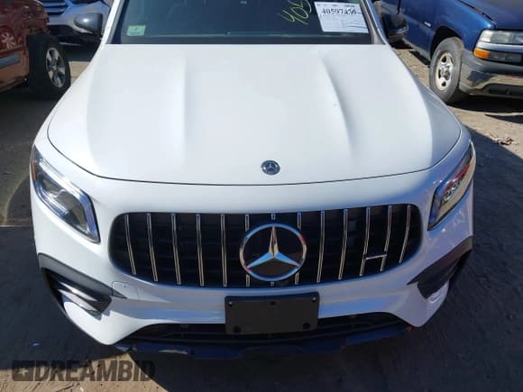 ✅ 2021 Mercedes-Benz GLB 35 AMG • VIN: W1N4M5BB1MW085895 • Lot: 40597439. Wystawiony na IAAI z przebiegiem 5 476 mil. Bezpłatny archiwum sprzedaży aukcyjnych z USA i szczegółowy raport historii pojazdu na DreamBid. Zdjęcie 13.
