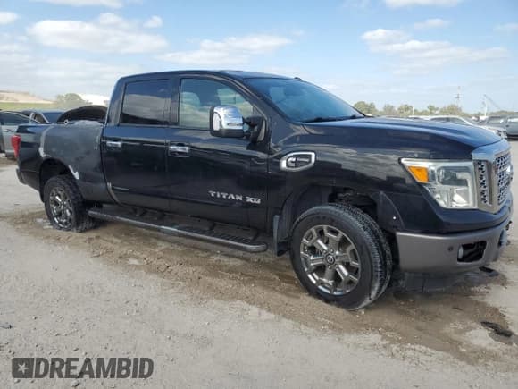 ✅ 2016 Nissan Titan Platinum Reserve • VIN: 1N6BA1F25GN508897 • Lot: 55090755. Listed on Copart with 175,850 mi. Free auction sales archive from the USA and detailed vehicle history report at DreamBid. Image 4.
