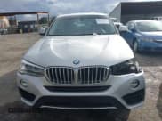 ✅ 2017 BMW X4 xDrive28i • VIN: 5UXXW3C3XH0T79913 • Lot: 43708564. Listed on IAAI with 100,865 mi. Free auction sales archive from the USA and detailed vehicle history report at DreamBid. Image 13.