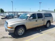 ✅ 2004 Dodge Dakota SLT • VIN: 1D7HL48N04S653798 • Lot: 42520546. Listed on IAAI with 115,259 mi. Free auction sales archive from the USA and detailed vehicle history report at DreamBid. Image 2.