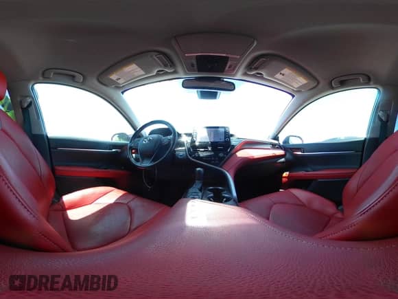 2021 Toyota Camry Hybrid XSE with VIN 4T1K31AK2MU020833, listed as a IAAI auction lot 42520233 with 86,176 mi miles and . Bid and sale history available at DreamBid. Image 18.