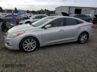 2012 Hyundai Azera z VIN KMHFH4JGXCA123949, wystawiony jako Copart lot #53499005 z przebiegiem 184 083 mil mil oraz Czysty tytuł • Clean title. Historia ofert i sprzedaży dostępna na DreamBid. Obrazek 1.