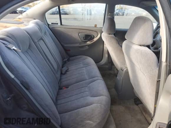 1998 Chevrolet Malibu LS z VIN 1G1NE52M5W6258534, wystawiony jako Copart lot #81074124 z przebiegiem Nie podano mil oraz Czysty tytuł • Clean title. Historia ofert i sprzedaży dostępna na DreamBid. Obrazek 10.