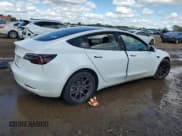 ✅ 2021 Tesla Model 3 Standard Range Plus • VIN: 5YJ3E1EA5MF045951 • Lot: 69593805. Wystawiony na Copart z przebiegiem 47 334 mil. Bezpłatny archiwum sprzedaży aukcyjnych z USA i szczegółowy raport historii pojazdu na DreamBid. Zdjęcie 3.