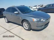 ✅ 2014 Mitsubishi Lancer ES • VIN: JA32U2FU0EU003871 • Lot: 43440579. Listed on IAAI with 155,039 mi. Free auction sales archive from the USA and detailed vehicle history report at DreamBid. Image 1.