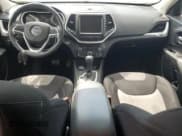 ✅ 2014 Jeep Cherokee Altitude • VIN: 1C4PJMCS1EW124461 • Lot: 62885365. Listed on Copart with 99,760 mi. Free auction sales archive from the USA and detailed vehicle history report at DreamBid. Image 8.