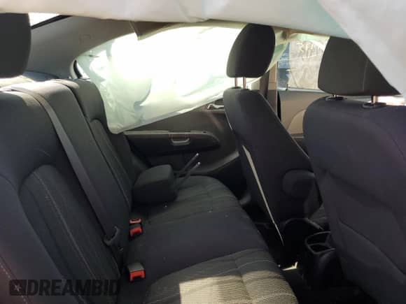 2014 Chevrolet Sonic LT z VIN 1G1JC5EHXE4119920, wystawiony jako Copart lot #60877975 z przebiegiem Nie podano mil oraz Szkoda całkowita • Salvage title. Historia ofert i sprzedaży dostępna na DreamBid. Obrazek 10.