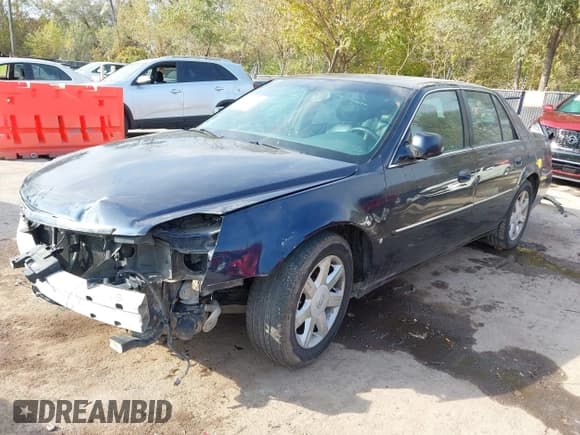 ✅ 2006 Cadillac DTS 1SC • VIN: 1G6KD57Y76U174061 • Лот: 43633291. Опубликован ранее на IAAI с пробегом 138 750 миль. Бесплатный доступ к архиву аукционных продаж из США и подробный отчёт об истории автомобиля на DreamBid. Изображение 2.