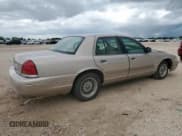 ✅ 1998 Ford Crown Victoria LX • VIN: 2FAFP74W1WX119043 • Lot: 63398405. Listed on Copart with 79,743 mi. Free auction sales archive from the USA and detailed vehicle history report at DreamBid. Image 3.