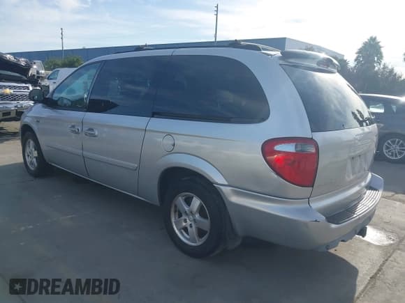 ✅ 2005 Dodge Caravan SXT • VIN: 2D4GP44L05R345986 • Lot: 43653111. Wystawiony na IAAI z przebiegiem 171 419 mil. Bezpłatny archiwum sprzedaży aukcyjnych z USA i szczegółowy raport historii pojazdu na DreamBid. Zdjęcie 3.