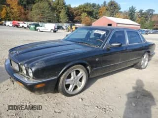 ✅ 1998 Jaguar XJ • VIN: SAJPX1840WC816044 • Lot: 76802374. Listed on Copart with 99,149 mi. Free auction sales archive from the USA and detailed vehicle history report at DreamBid. Image 1.