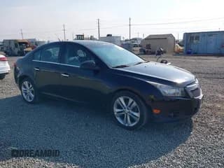 ✅ 2014 Chevrolet Cruze LTZ • VIN: 1G1PG5SB0E7257611 • Lot: 43106073. Listed on IAAI with 152,454 mi. Free auction sales archive from the USA and detailed vehicle history report at DreamBid. Image 1.