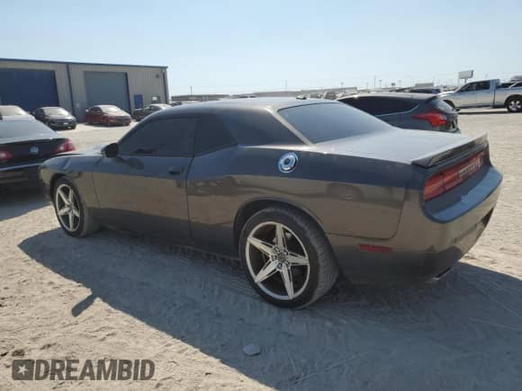 2013 Dodge Challenger SXT z VIN 2C3CDYAGXDH591441, wystawiony jako Copart lot #71681964 z przebiegiem 174 043 mil mil oraz Czysty tytuł • Clean title. Historia ofert i sprzedaży dostępna na DreamBid. Obrazek 2.
