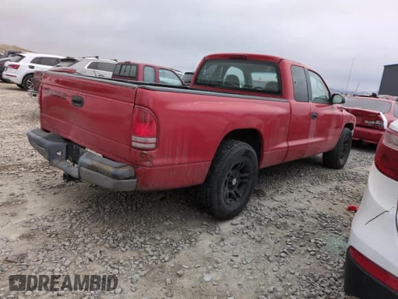 ✅ 2001 Dodge Dakota • VIN: 1B7GL22X41S256594 • Lot: 43012935. Wystawiony na Copart z przebiegiem 217 179 mil. Bezpłatny archiwum sprzedaży aukcyjnych z USA i szczegółowy raport historii pojazdu na DreamBid. Zdjęcie 3.