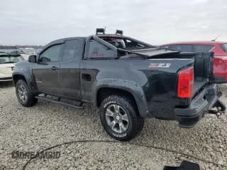 ✅ 2020 Chevrolet Colorado 4WD Z71 • VIN: 1GCHTDENXL1110011 • Лот: 42571084. Опубликован ранее на Copart с пробегом 38 247 миль. Бесплатный доступ к архиву аукционных продаж из США и подробный отчёт об истории автомобиля на DreamBid. Изображение 2.
