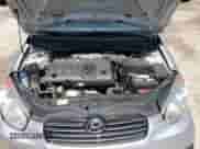 2010 Hyundai Accent GLS z VIN KMHCN4AC6AU468660, wystawiony jako Copart lot #66367444 z przebiegiem 104 341 mil mil oraz Szkoda całkowita • Salvage title. Historia ofert i sprzedaży dostępna na DreamBid. Obrazek 11.