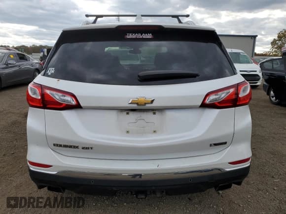 ✅ 2018 Chevrolet Equinox Premier • VIN: 2GNAXNEX0J6162620 • Lot: 90054795. Wystawiony na Copart z przebiegiem 126 489 mil. Bezpłatny archiwum sprzedaży aukcyjnych z USA i szczegółowy raport historii pojazdu na DreamBid. Zdjęcie 6.