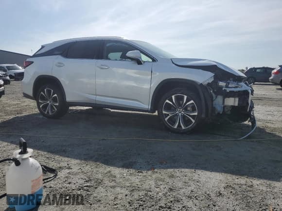 ✅ 2021 Lexus RX 350L • VIN: JTJHZKFA6M2028946 • Lot: 61445525. Listed on Copart with 60,641 mi. Free auction sales archive from the USA and detailed vehicle history report at DreamBid. Image 4.