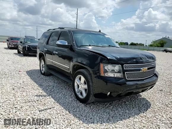 ✅ 2013 Chevrolet Tahoe LTZ • VIN: 1GNSCCE0XDR336905 • Lot: 69654885. Listed on Copart with 165,547 mi. Free auction sales archive from the USA and detailed vehicle history report at DreamBid. Image 14.