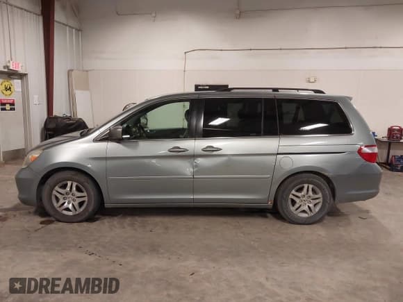 ✅ 2006 Honda Odyssey EX • VIN: 5FNRL38456B118496 • Lot: 43714481. Listed on IAAI with 224,673 mi. Free auction sales archive from the USA and detailed vehicle history report at DreamBid. Image 15.