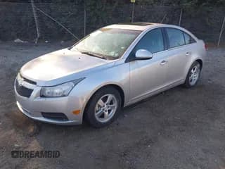✅ 2013 Chevrolet Cruze 1LT • VIN: 1G1PC5SB8D7310095 • Lot: 43429983. Listed on IAAI with 180,183 mi. Free auction sales archive from the USA and detailed vehicle history report at DreamBid. Image 2.