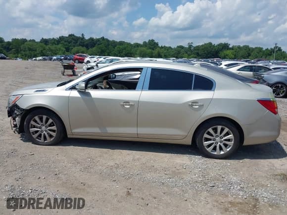 ✅ 2014 Buick LaCrosse Leather • VIN: 1G4GB5GR2EF285584 • Лот: 42604656. Опубликован ранее на IAAI с пробегом 162 349 миль. Бесплатный доступ к архиву аукционных продаж из США и подробный отчёт об истории автомобиля на DreamBid. Изображение 14.