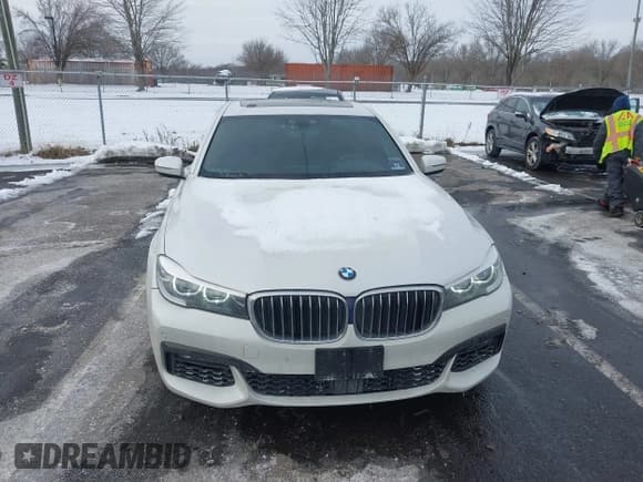 ✅ 2018 BMW 7 Series 740i xDrive • VIN: WBA7E4C59JGV23876 • Lot: 41381398. Listed on IAAI with 106,675 mi. Free auction sales archive from the USA and detailed vehicle history report at DreamBid. Image 12.