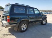 ✅ 1995 Toyota Land Cruiser • VIN: JT3DJ81W6S0106332 • Lot: 47772055. Listed on Copart with 214,499 mi. Free auction sales archive from the USA and detailed vehicle history report at DreamBid. Image 3.
