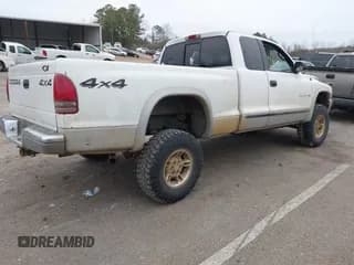 ✅ 1999 Dodge Dakota SLT • VIN: 1B7GG22X3XS223969 • Lot: 41329085. Wystawiony na IAAI z przebiegiem 185 859 mil. Bezpłatny archiwum sprzedaży aukcyjnych z USA i szczegółowy raport historii pojazdu na DreamBid. Zdjęcie 4.