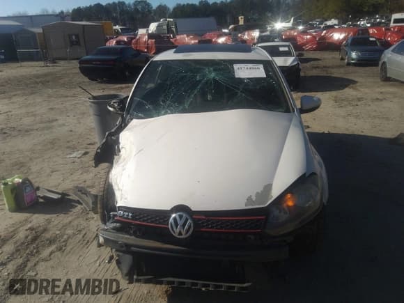 ✅ 2012 Volkswagen Golf GTI w/Conv & Sunroof • VIN: WVWEV7AJ5CW094384 • Lot: 41744860. Listed on IAAI with 157,285 mi. Free auction sales archive from the USA and detailed vehicle history report at DreamBid. Image 13.