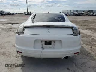 ✅ 2009 Mitsubishi Eclipse GS • VIN: 4A3AK24F19E038830 • Lot: 79469074. Wystawiony na Copart z przebiegiem 69 706 mil. Bezpłatny archiwum sprzedaży aukcyjnych z USA i szczegółowy raport historii pojazdu na DreamBid. Zdjęcie 6.
