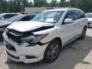 ✅ 2016 Infiniti QX60 • VIN: 5N1AL0MN2GC517385 • Lot: 42828959. Listed on IAAI with 123,330 mi. Free auction sales archive from the USA and detailed vehicle history report at DreamBid. Image 17.