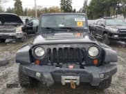 ✅ 2012 Jeep Wrangler Rubicon • VIN: 1C4BJWCGXCL205250 • Lot: 91591885. Wystawiony na Copart z przebiegiem 158 119 mil. Bezpłatny archiwum sprzedaży aukcyjnych z USA i szczegółowy raport historii pojazdu na DreamBid. Zdjęcie 5.