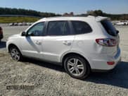 ✅ 2012 Hyundai Santa Fe SE • VIN: 5XYZH4AG4CG110518 • Lot: 77423244. Listed on Copart with 170,903 mi. Free auction sales archive from the USA and detailed vehicle history report at DreamBid. Image 2.