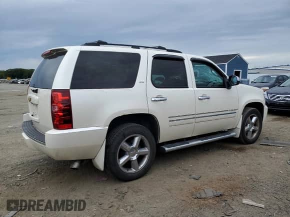 2013 Chevrolet Tahoe LTZ с VIN 1GNSKCE01DR267797, выставлен на аукционе Copart как лот 66854655 с пробегом 119 588 миль миль и Чистый • Clean title. История ставок и продаж доступна на DreamBid. Изображение 3.