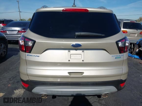 ✅ 2018 Ford Escape Titanium • VIN: 1FMCU0J95JUC09285 • Lot: 43574364. Listed on IAAI with 21,768 mi. Free auction sales archive from the USA and detailed vehicle history report at DreamBid. Image 16.