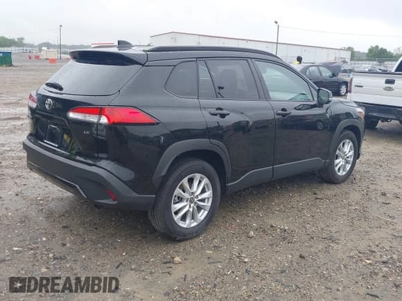 ✅ 2023 Toyota Corolla Cross LE • VIN: 7MUCAAAG0PV053404 • Лот: 42318679. Опубликован ранее на IAAI с пробегом 34 969 миль. Бесплатный доступ к архиву аукционных продаж из США и подробный отчёт об истории автомобиля на DreamBid. Изображение 4.