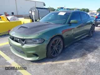 2020 Dodge Charger Scat Pack with VIN 2C3CDXGJ6LH120477, listed as a IAAI auction lot 43560203 with Not provided miles and . Bid and sale history available at DreamBid. Image 2.