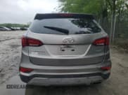 ✅ 2017 Hyundai Santa Fe 2.4L • VIN: 5NMZU3LB8HH032409 • Lot: 57939915. Listed on Copart with 105,494 mi. Free auction sales archive from the USA and detailed vehicle history report at DreamBid. Image 6.
