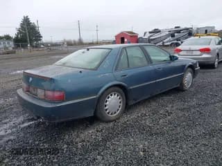 ✅ 1993 Cadillac Seville Touring STS • VIN: 1G6KY5290PU821230 • Lot: 41778659. Wystawiony na IAAI z przebiegiem 197 001 mil. Bezpłatny archiwum sprzedaży aukcyjnych z USA i szczegółowy raport historii pojazdu na DreamBid. Zdjęcie 4.